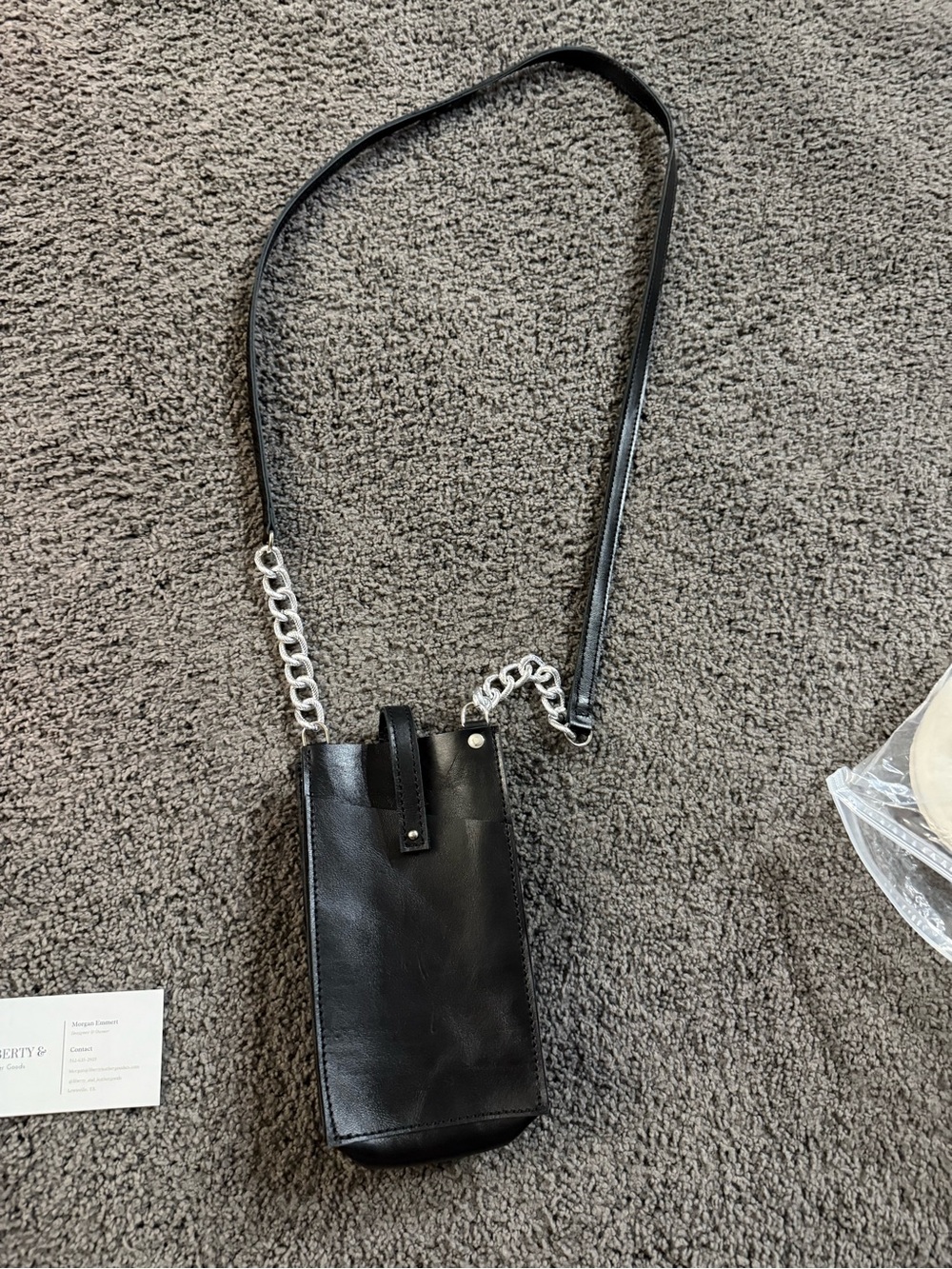Black Leather Crossbody Phone Bag with Chain Accent
